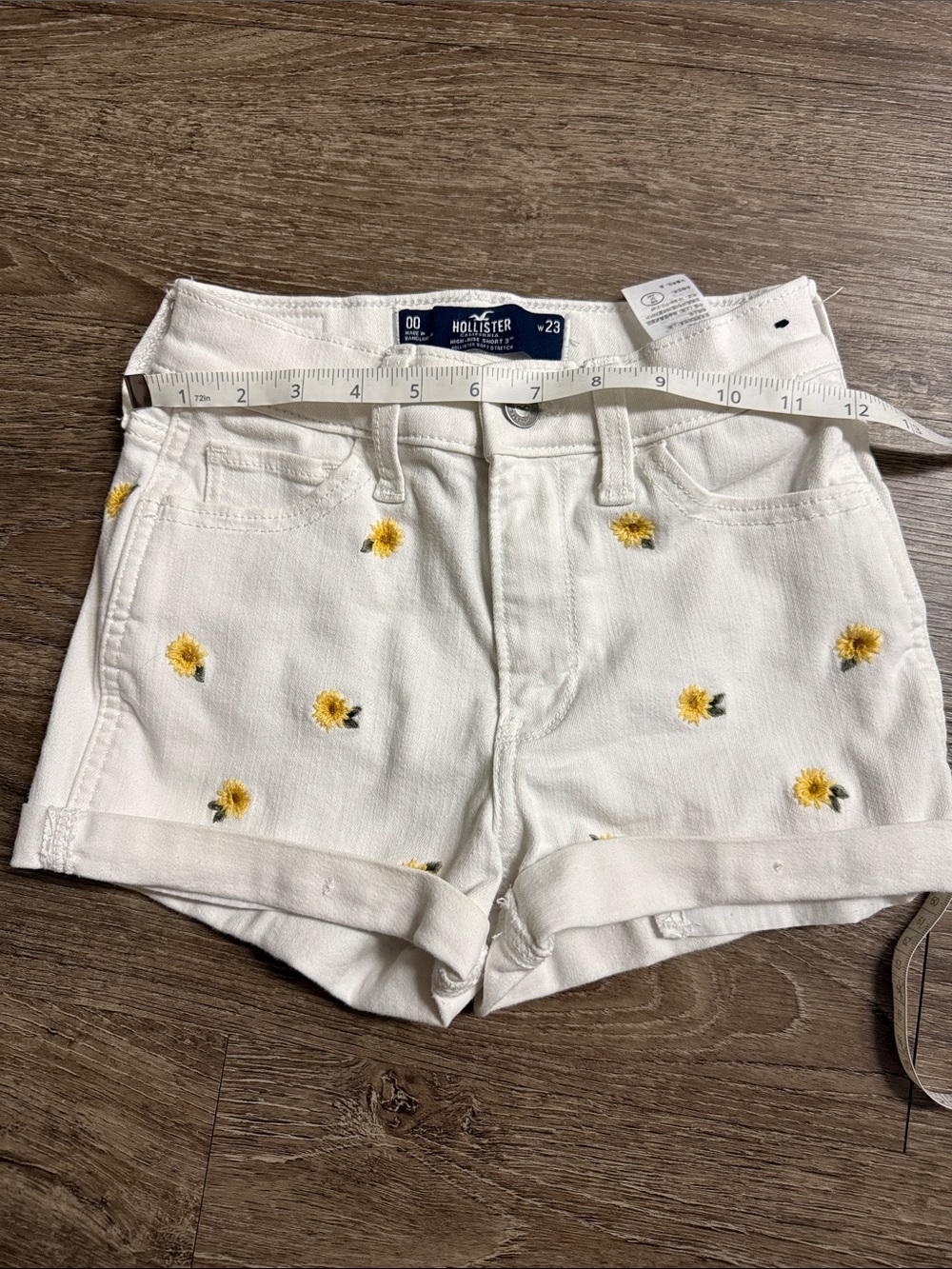 Hollister White Denim Shorts with Yellow Embroidered Flowers